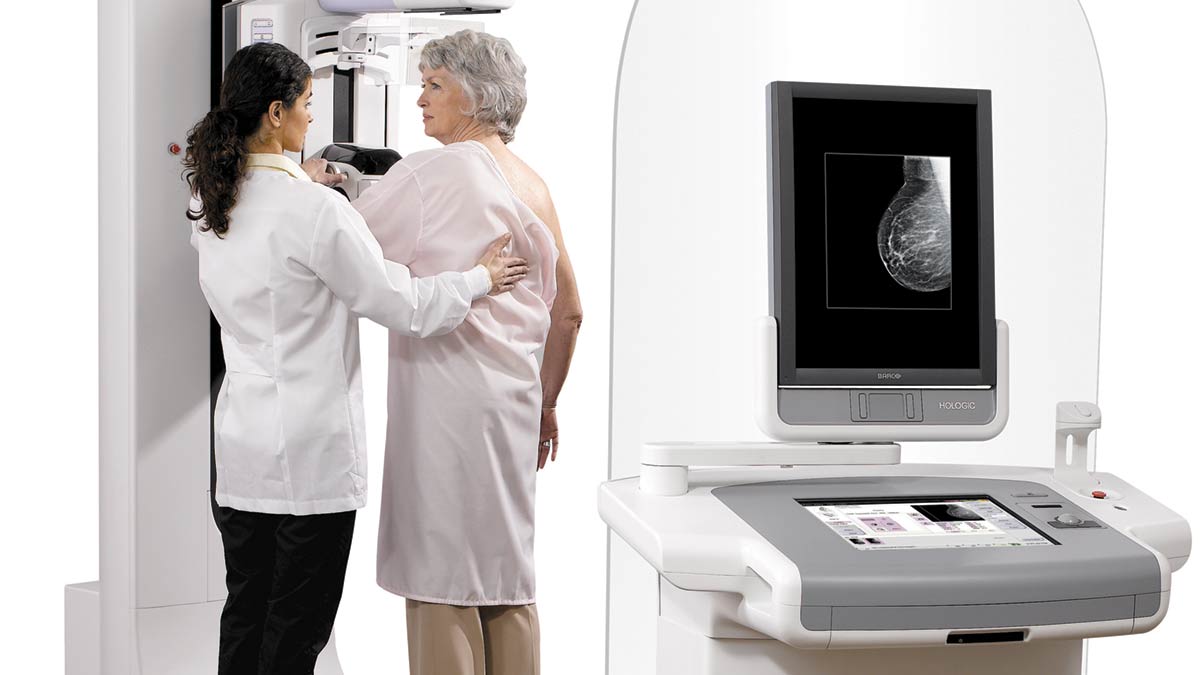 3D Mammography, Selenia Dimensions System being used to screen a patient