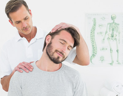 Patient receiving a chiropractic adjustment for pain