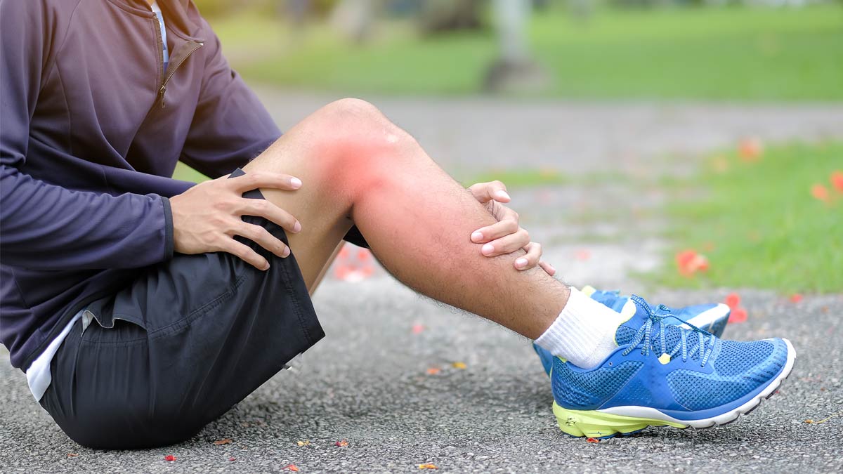 A runner massages an injury. What to do? What to do? See CORA Physical Therapy about your running injury!