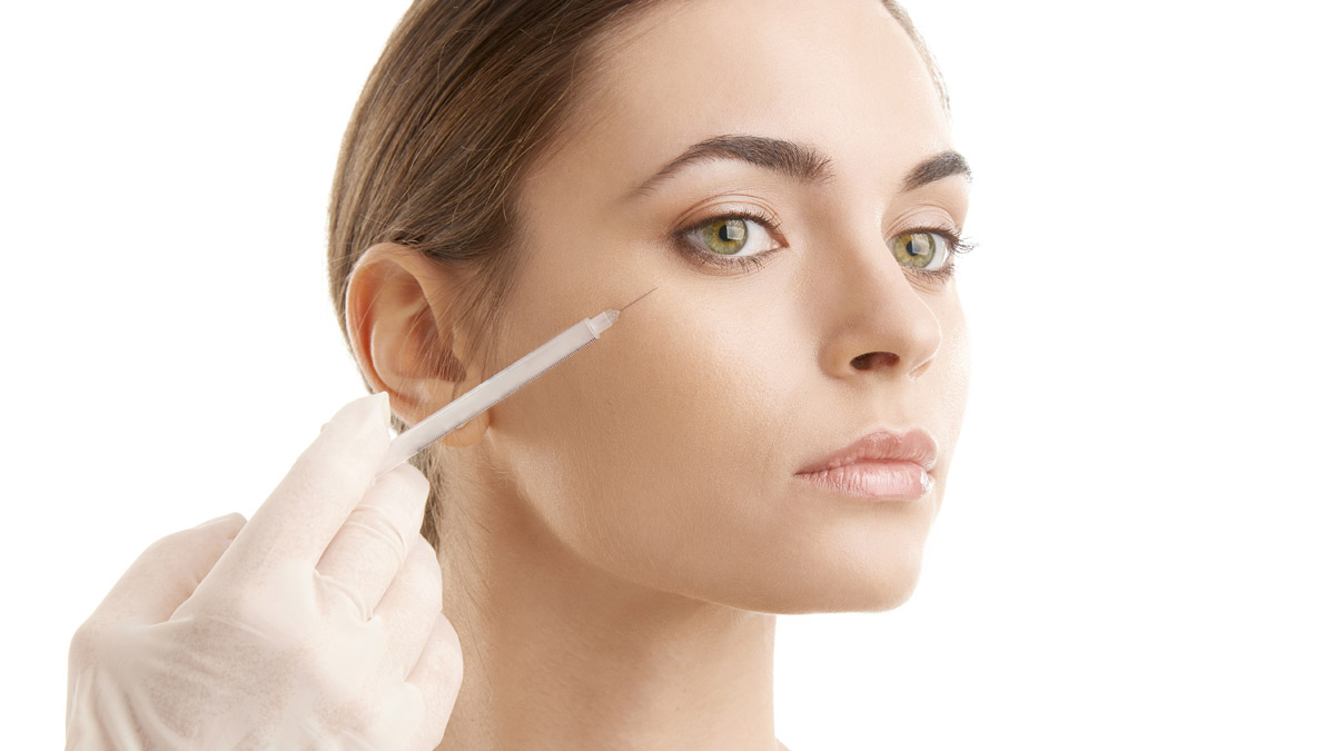 A woman getting a botox injection