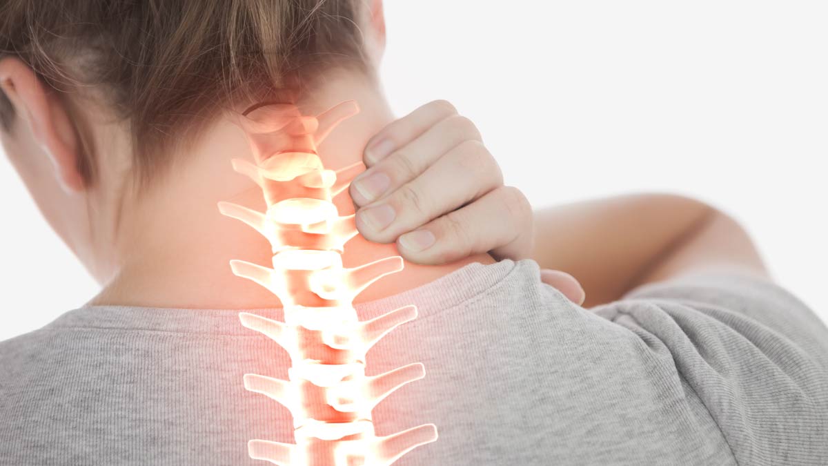 Woman with neck pain. Blame your back for that pain in the neck.