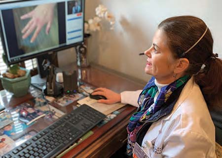 Dr. Kay Durst treats a patient using telemedicine at East Cooper Medical Center.