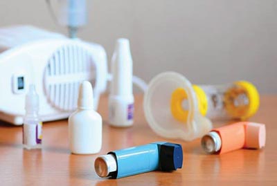 Inhalers, a nebulizer (asthma machine) and sprays