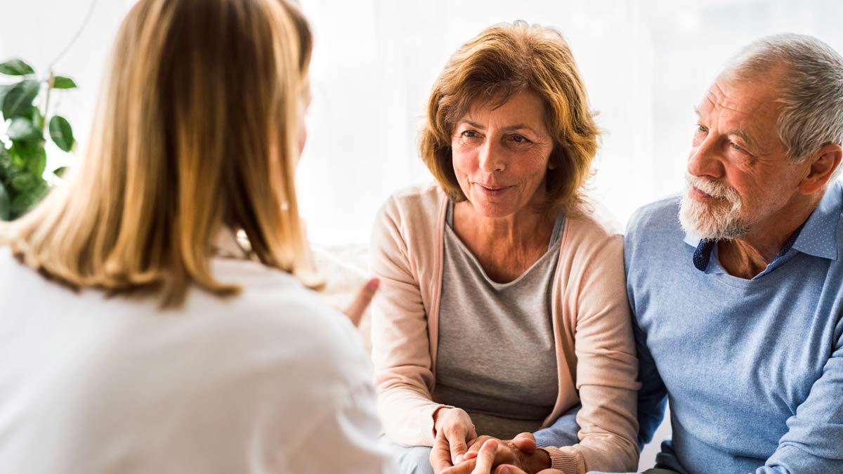 An elderly couple getting advice & assistance