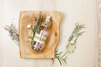 Smells: losemary and lavender essential oils and green on a cutting board