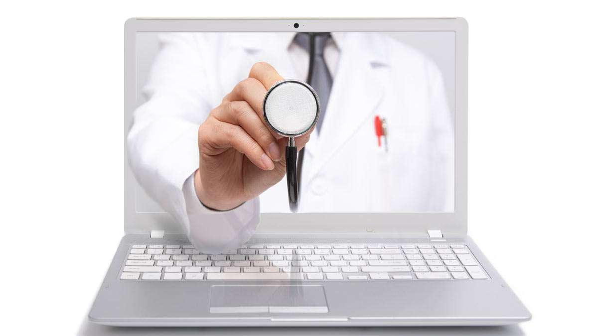 TELEHEALTH: Image of a doctor reaching through a laptop's video screen