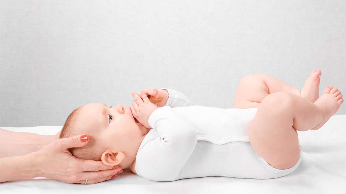 Chiropractor with Infant Patient