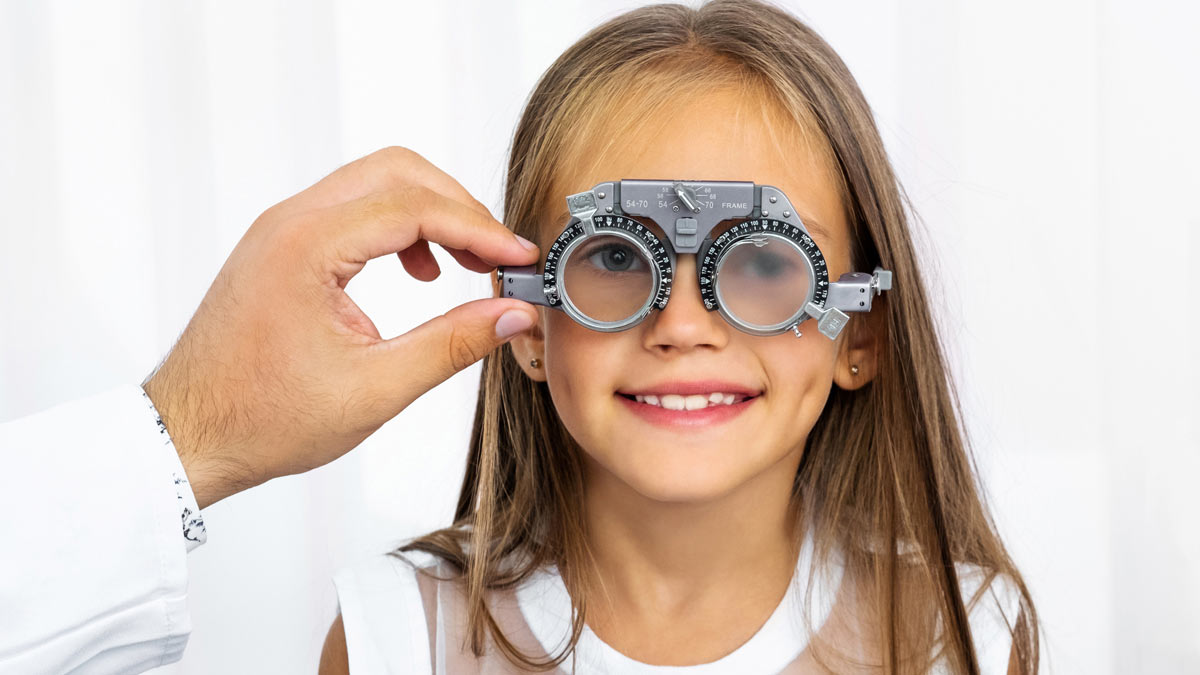 A young girl getting an eye exam