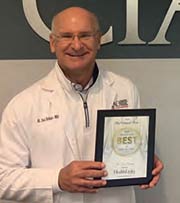 DRS. DEL SCHUTTE and JOHN M. GRAHAM named BEST ORTHOPEDIC DOCTOR. Dr. Del Schutte pictured.