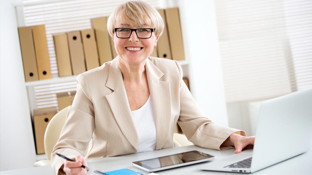 A retirement-aged woman at work.