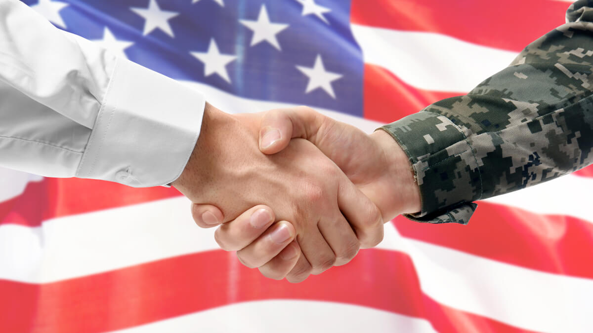 Soldier and civilian handshake - Veterans Ascend