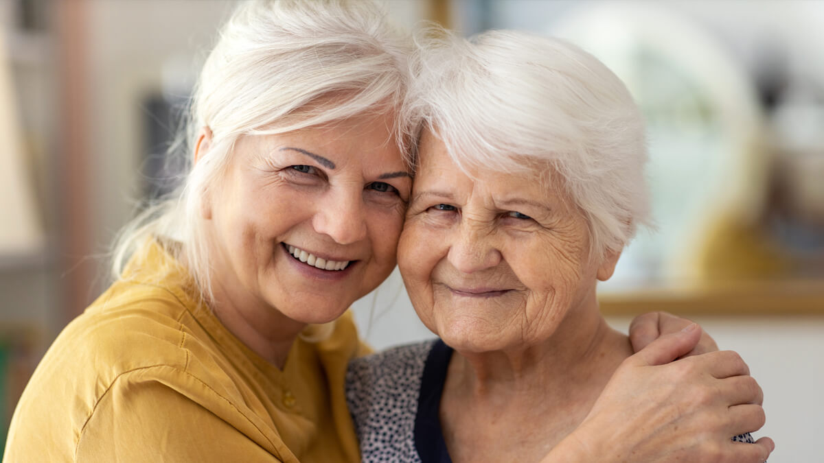 Two happy seniors at Sandpiper Courtyard Assisted Living