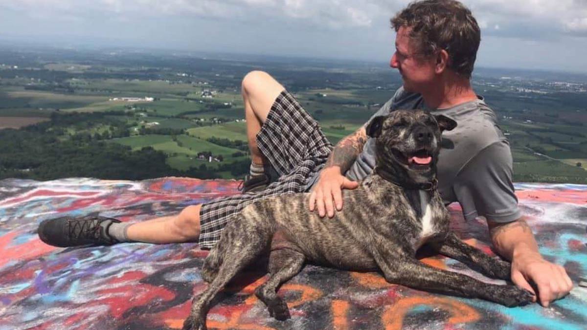 Erik Caldwell and his four-legged buddy take in the vista