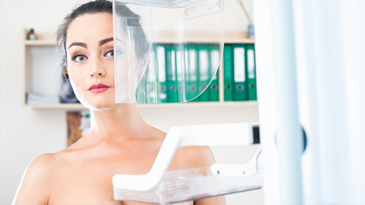 Woman getting a medical scan at primary care doctor