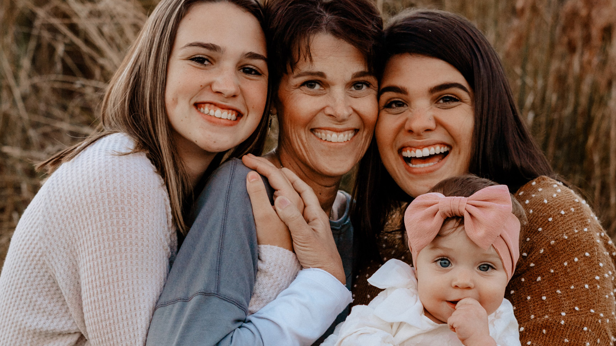 A group of women and a baby