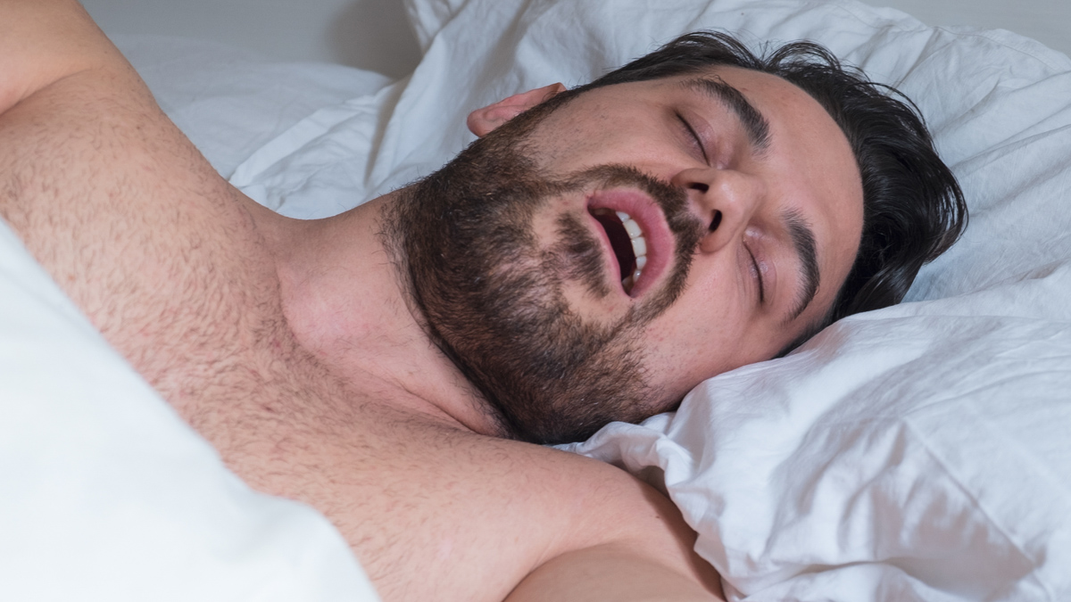 Man sleeping with his mouth open