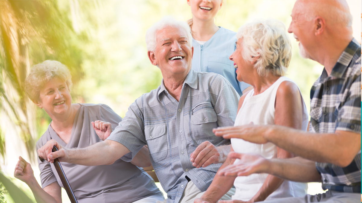 Photo of men and women laughing