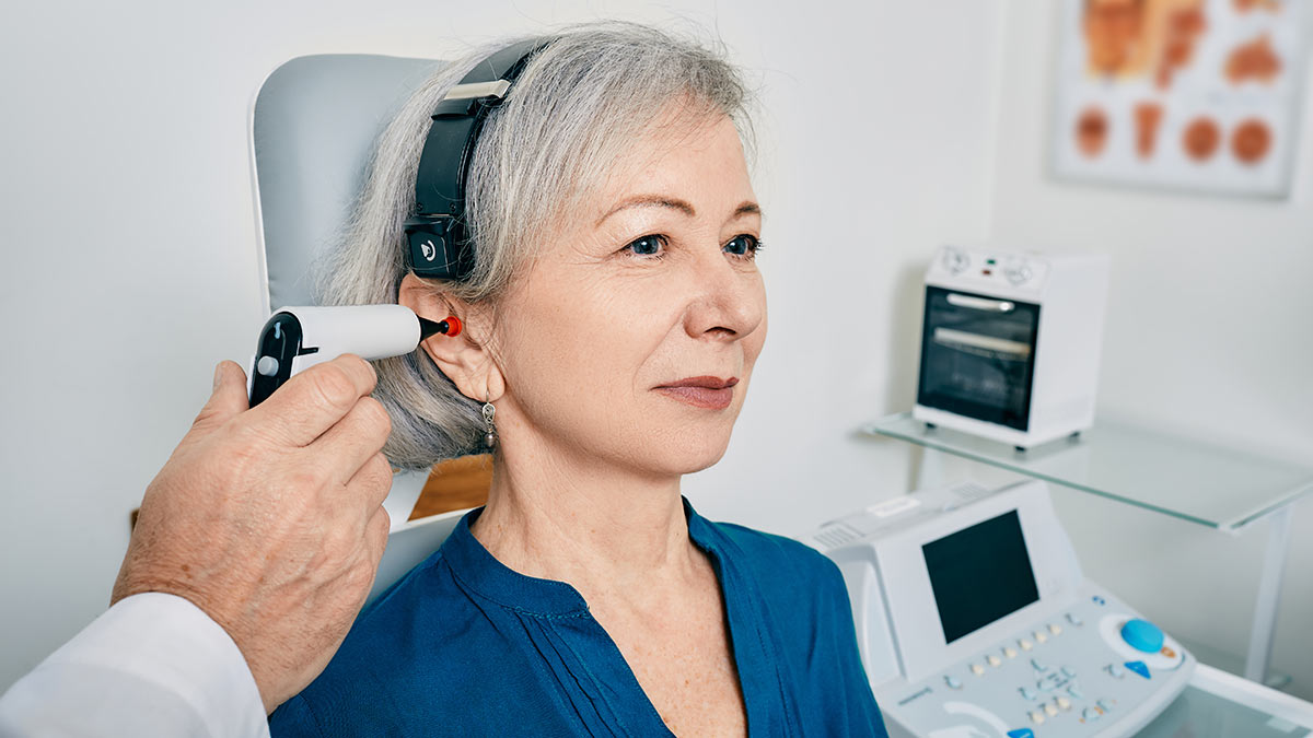 Stock photo: woman at hearing aid fitting