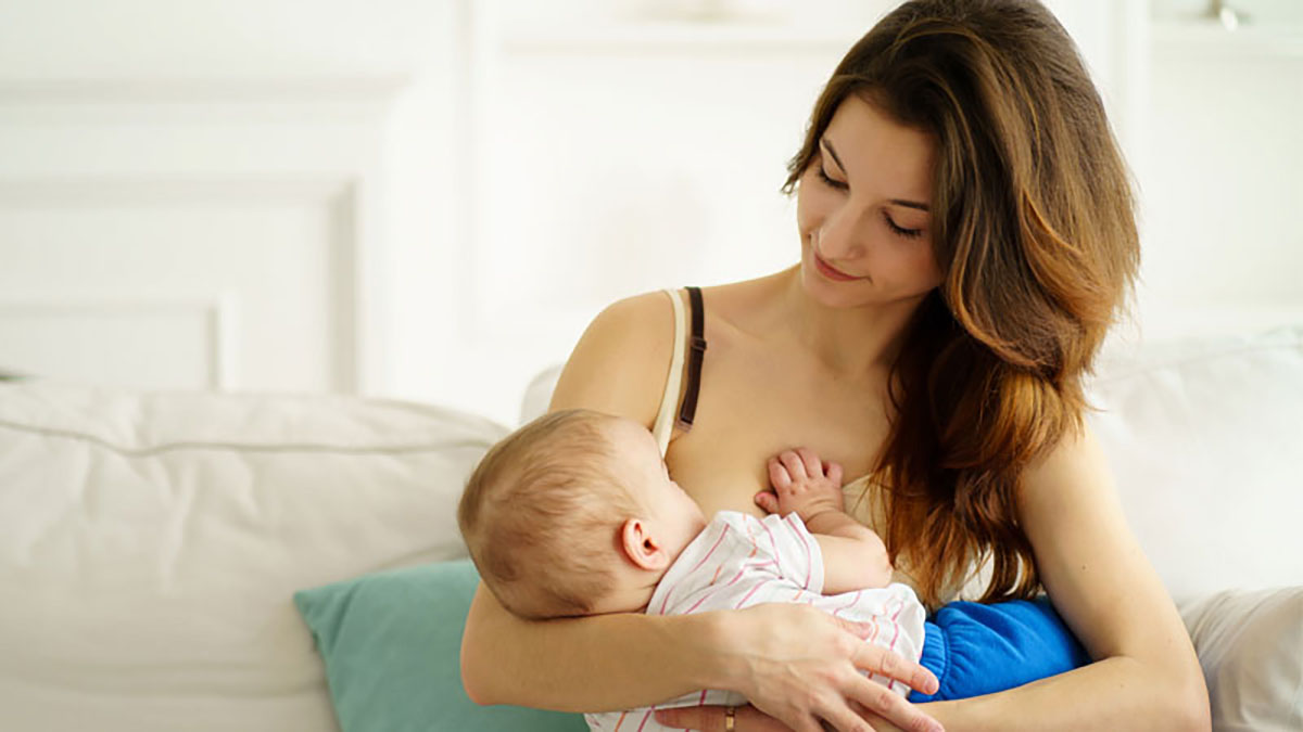 Photo of a woman who is breastfeeding a baby