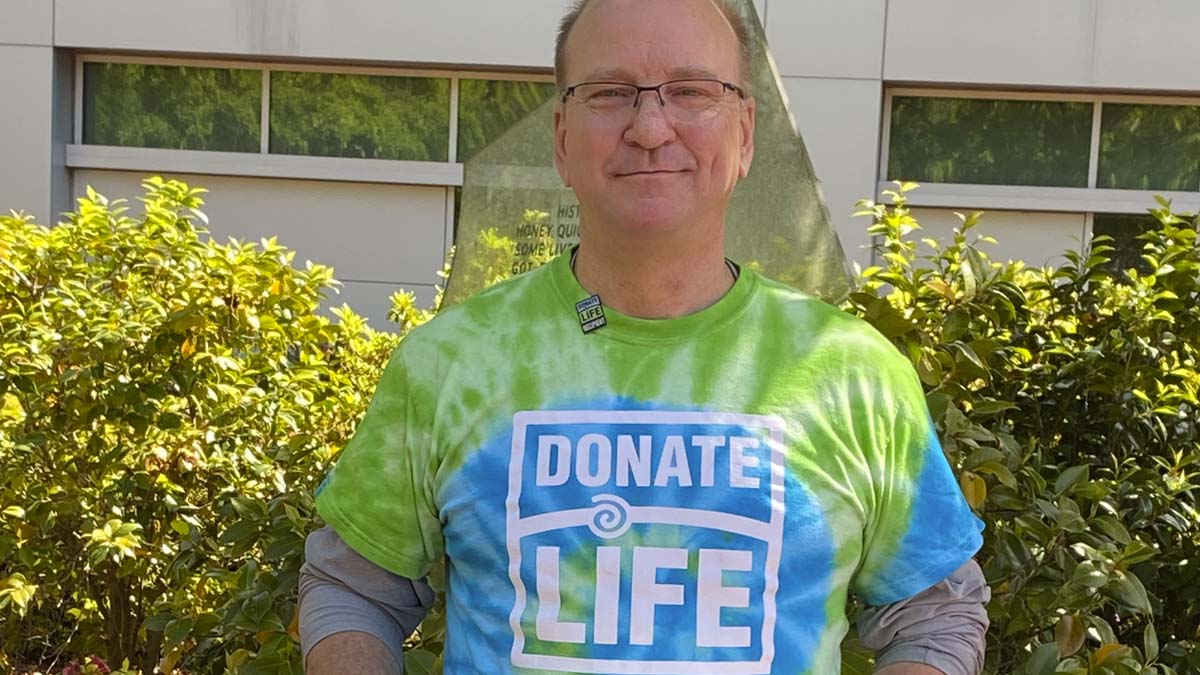 Photo of a man with a donate life shirt on