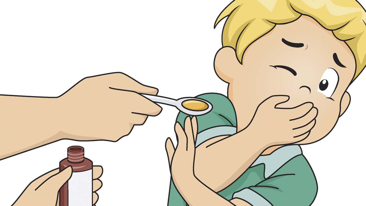 Photo of a hand giving a child a spoonful of medicine