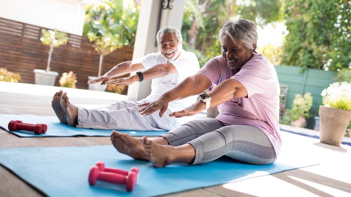 Photo of a man and woman stretching