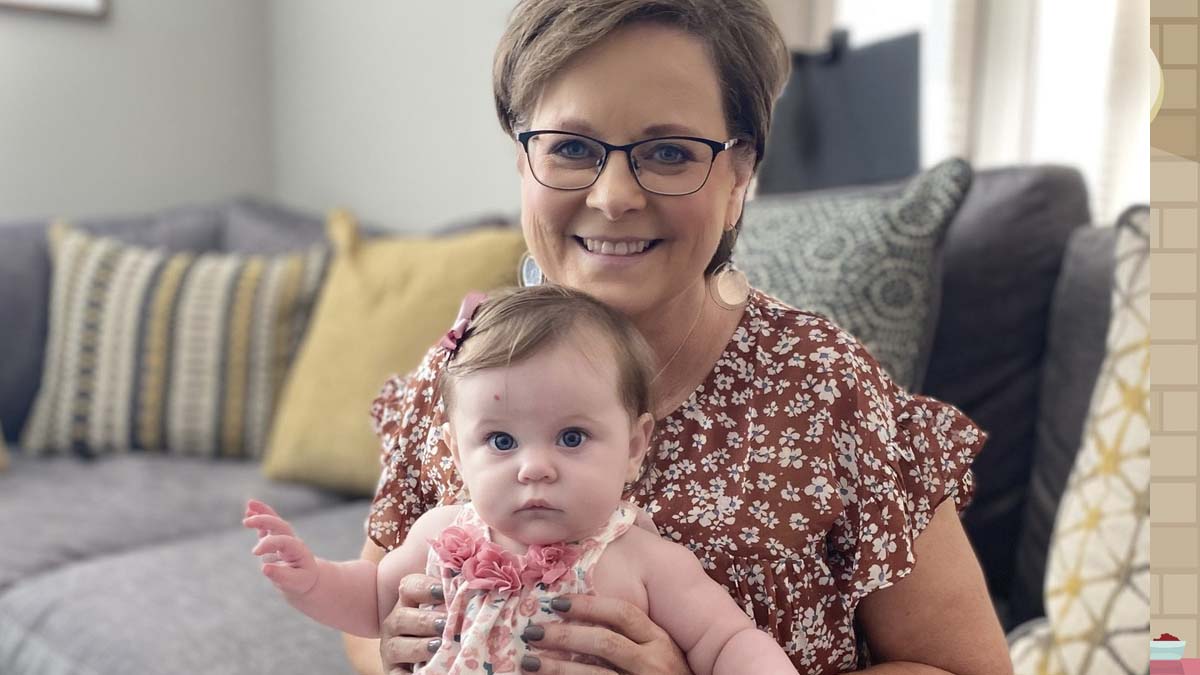 Photo of a woman holding a baby