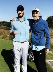 Cullen on the golf course with his father, Michael Kemp.