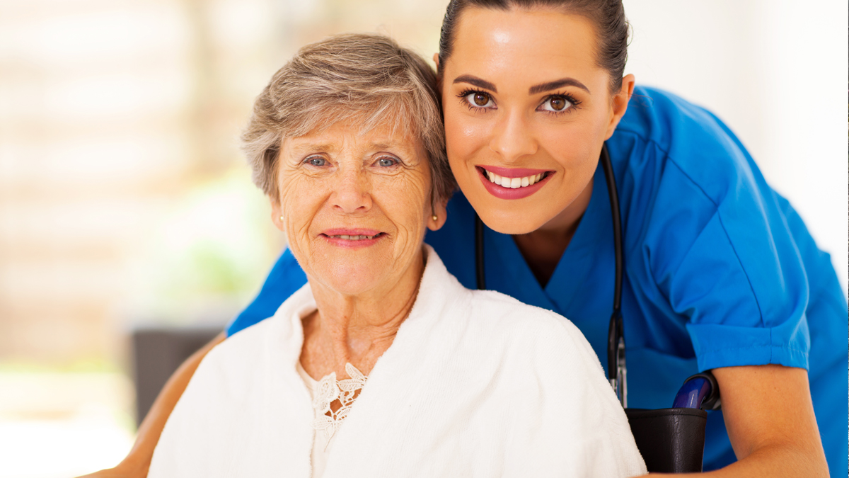 Photo of two women who are smiling