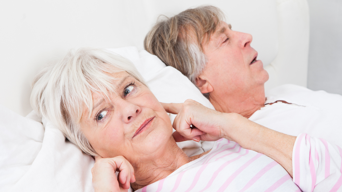 Photof of a man and woman laying down