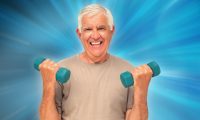 Photo of an older man who has weights in both of his hands