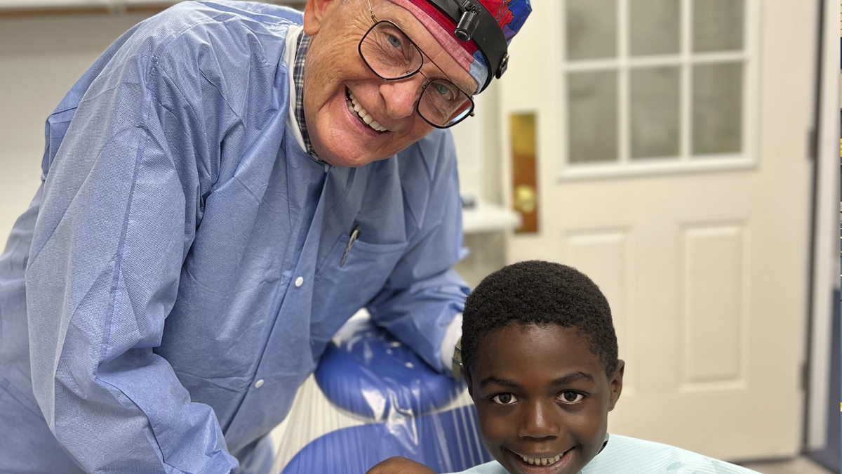 Photo of an older man with a young child