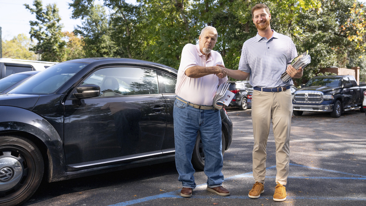 Photo of two men shaking hands