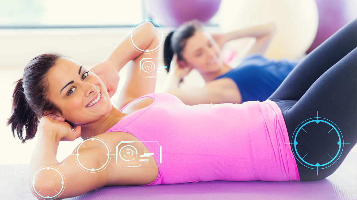 Photo of a woman who is smiling and exercising