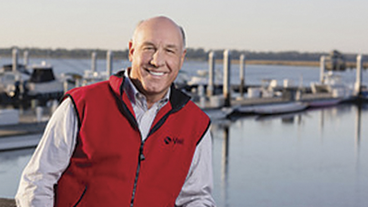 Photo of a man in front of the water